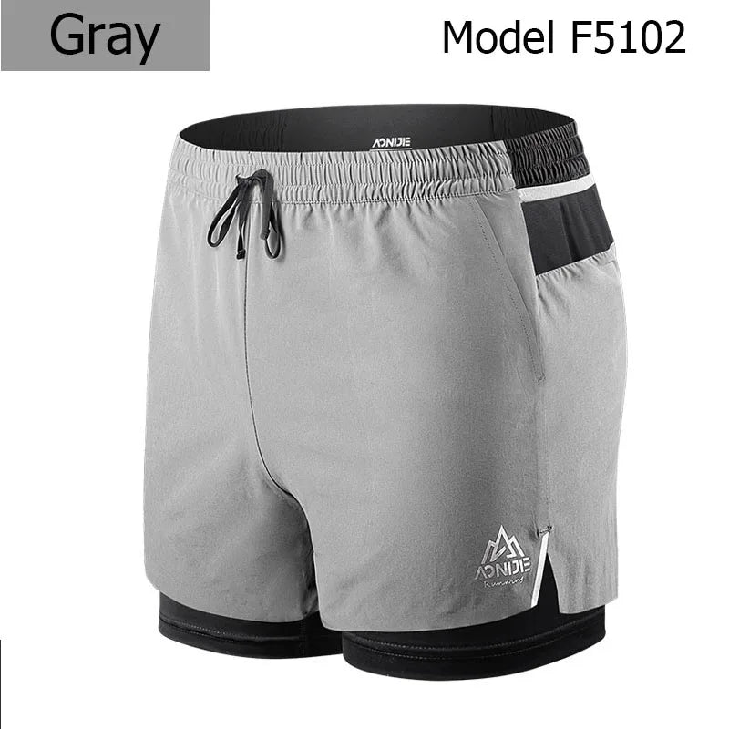 AONIJIE F5102 Men Quick Dry Sports Shorts Trunks Athletic Shorts With Lining Prevent Wardrobe Malf For Running Gym Soccer Tennis